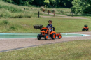 F2060AM Traktor Kubota M135GX z ładowaczem czołowym i przyczepą jeździk Falk