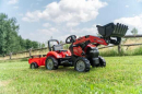 F961AM Traktor Case IH Maxxum 130 CVX z ładowaczem czołowym i przyczepą jeździk Falk